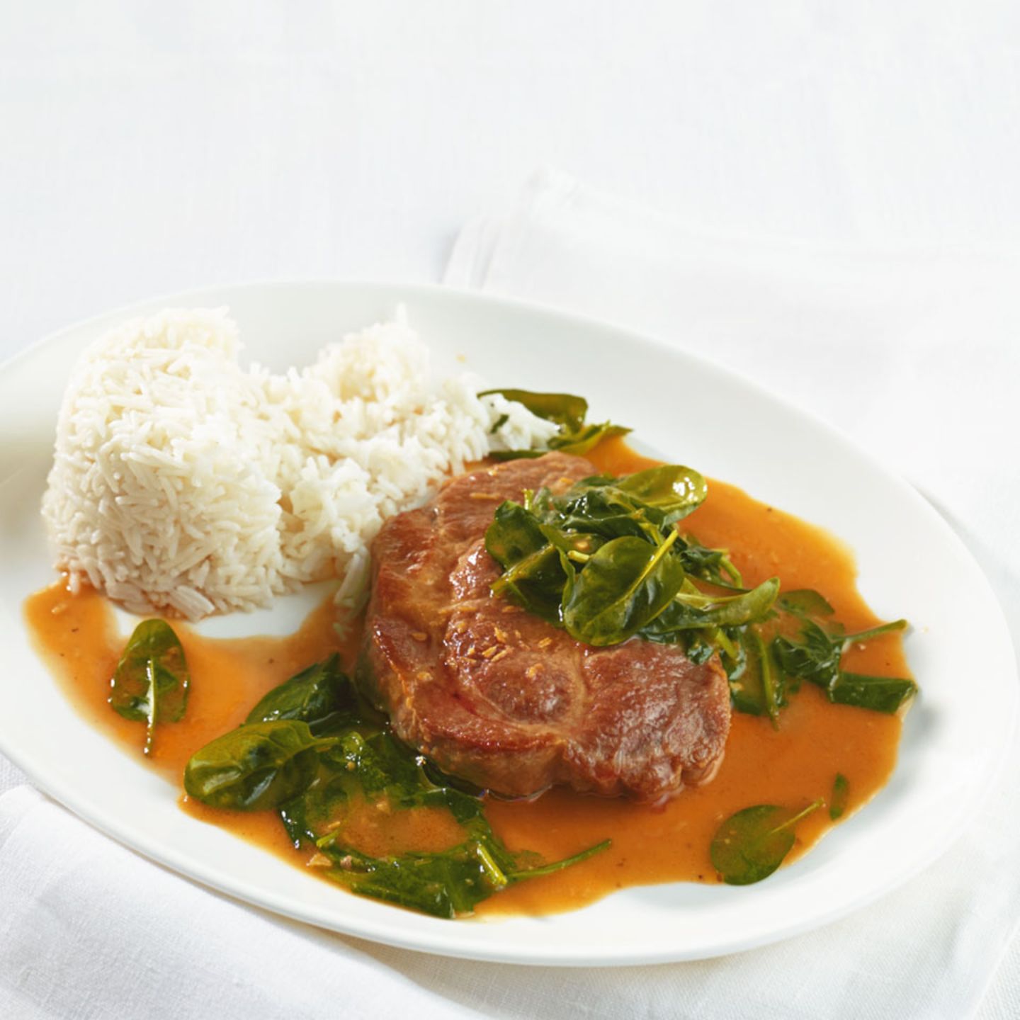 Curry-Steak mit Spinat