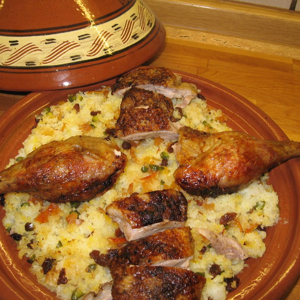 Glasierte Ente auf persischem Reis
