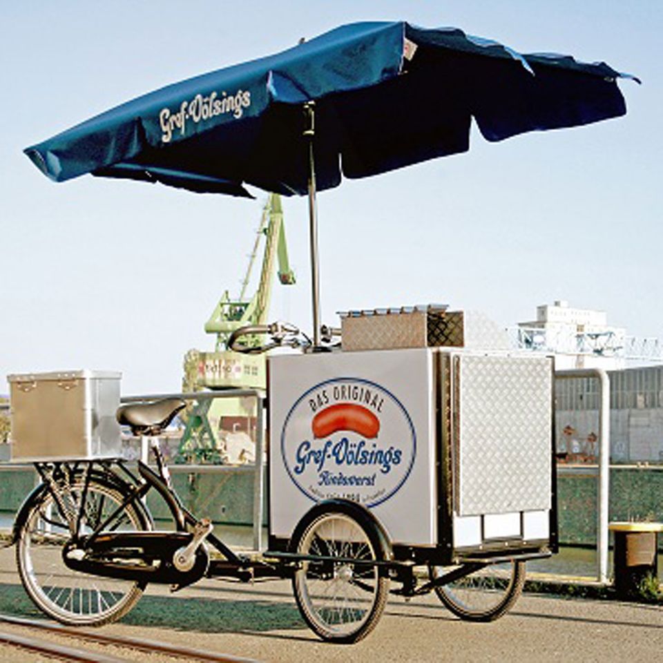 Vorbildlich: das Grillfahrrad ist mit Sonnenschutz ausgestattet Vorbildlich: das Grillfahrrad ist mit Sonnenschutz ausgestattet