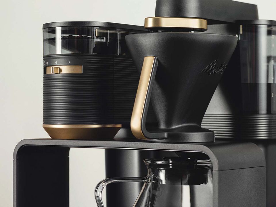 Melitta EPOS: links das Kaffeemahlwerk, rechts die Filtermaschine Melitta EPOS: links das Kaffeemahlwerk, rechts die Filtermaschine