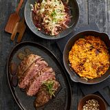 Wildschweinnacken mit Süßkartoffel-Rösti und Schwarzwurzeln